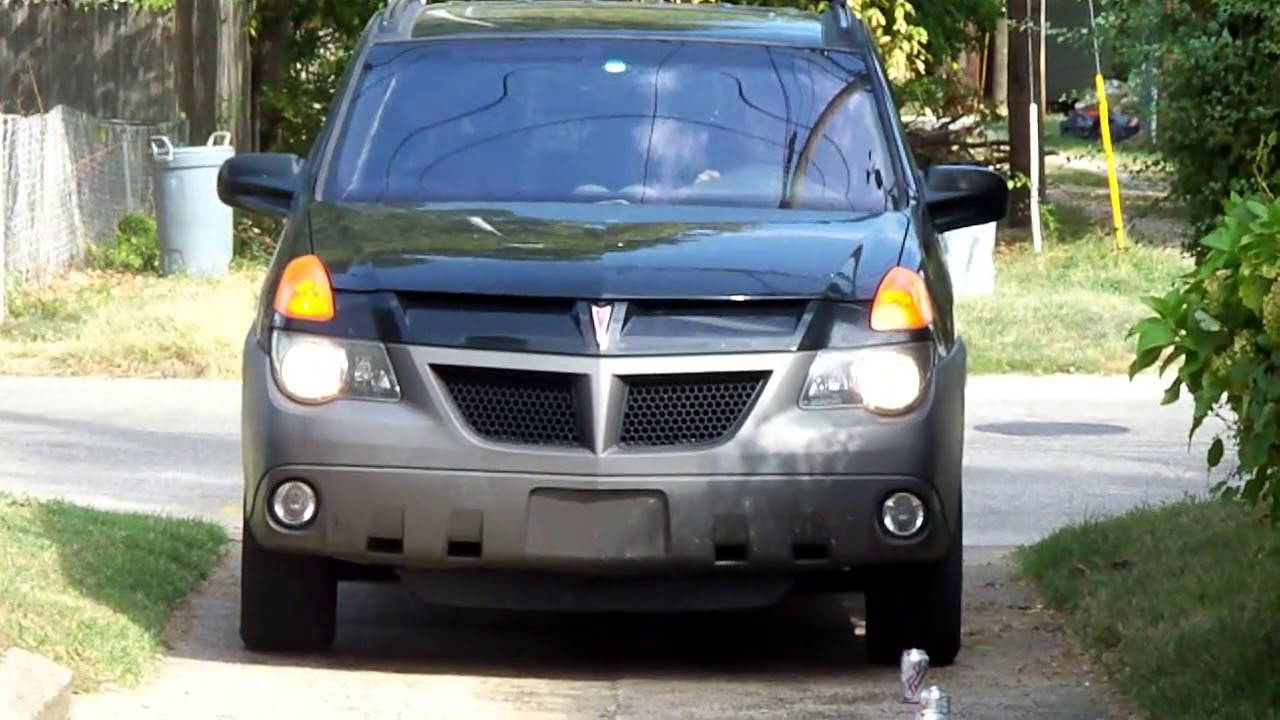 Cans & Bottles Crushed Under Car Tires