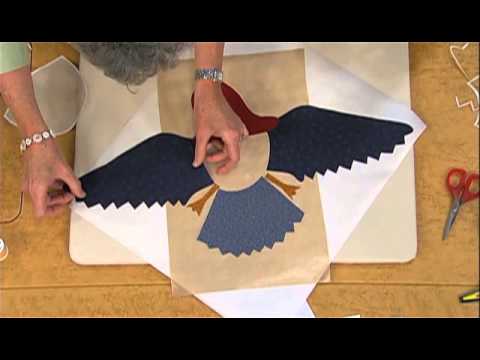 love of quilting assembling applique pieces on a pressing sheet pressing sheet