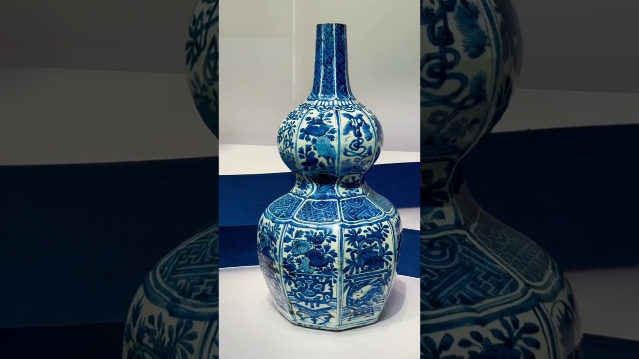 Blue-and-white octagonal double‑gourd vase with floral and 
