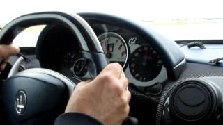 Edo Competition Maserati Mc12 accelerating on cold lake runway
