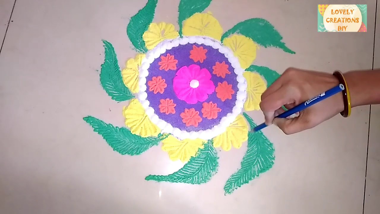Beautiful rangoli design using pencil ️ ll flower and leaves in design ...