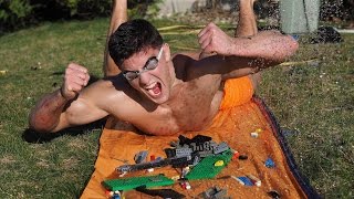 EXTREME LEGO SLIP 'N SLIDE CHALLENGE | Bodybuilder VS Most Dangerous Kid Toys Of All Time