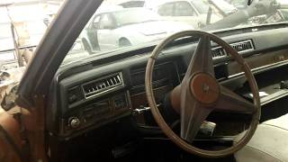 mid 1970's Cadillac Coupe Deville in Pick n Pull , Oakland, CA