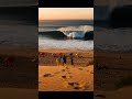 Surfers Flee Massive Wave!