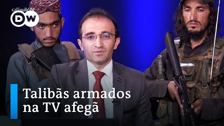 Âncora afegão apresenta programa cercado por talibãs armados