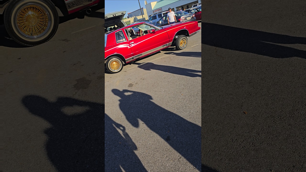 Candy Red Monte Carlo Lowrider on Gold Daytons 