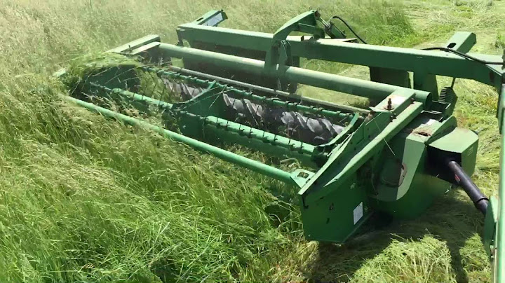 First hay cutting with a John Deere  720 MoCo and a 3010.