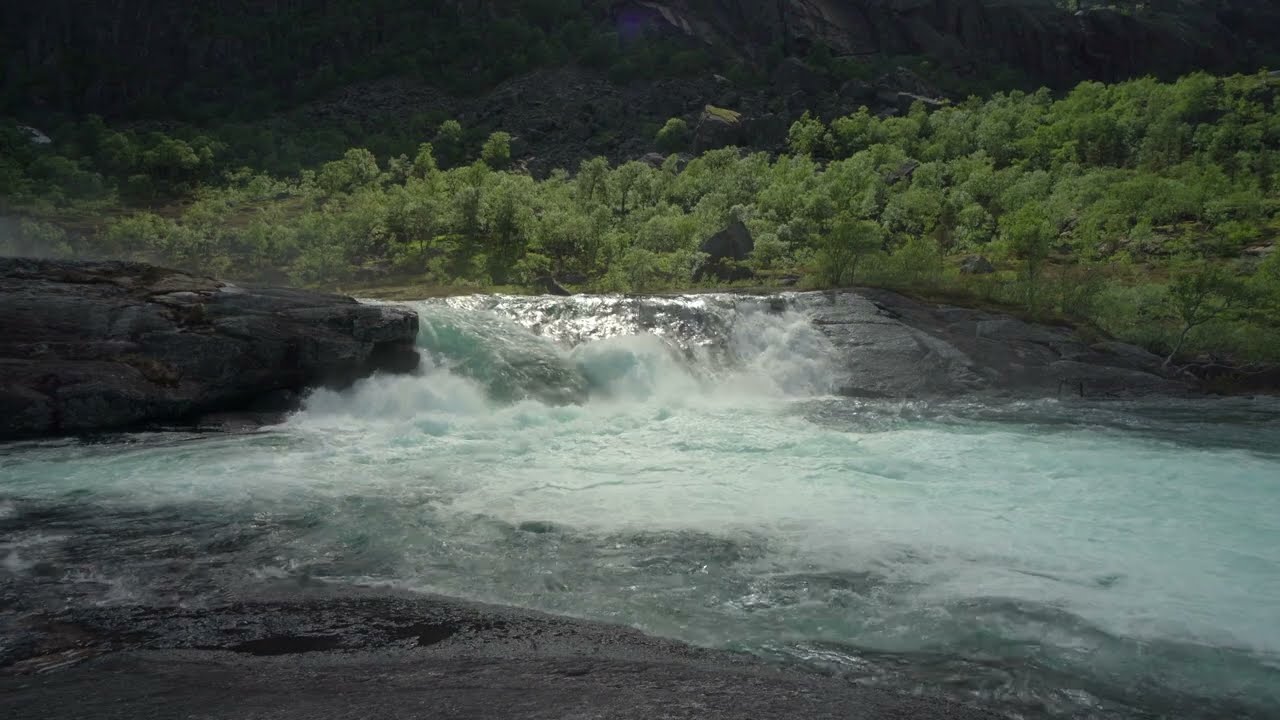 Shiny waterfall in Norwegian mountains