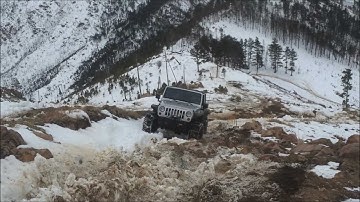 Supercharged Jeep Rubicon Testing All Four Snow Chains In Rough Terrain - snow  chains jeep wrangler