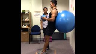 Wall ball squat - single leg