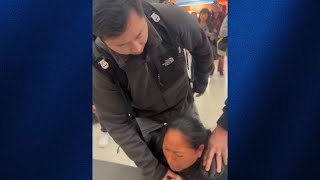 Bystanders demand badges as plainclothes ICE agents detain woman at San Francisco airport