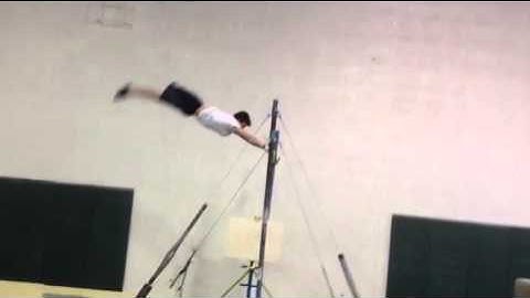 George Khoury Double Back of High Bar (landing on mats)