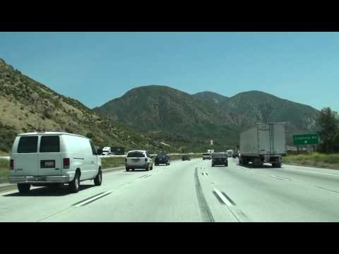 video follows i-15 in Southern California from the Canjon Summit , to I-215 In The Los Angeles Area . video provides southbound footage of the Cajon Summit , and Cajon pass