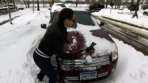 Spring snowfall hits winter-weary Minnesota