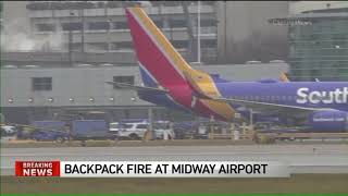 Backpack catches fire on aircraft at Midway Airport