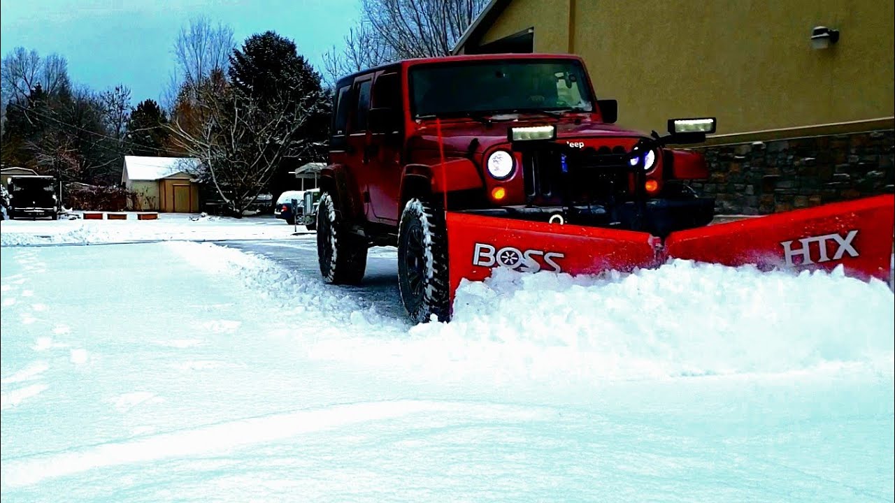 BOSS HTX!!! PLOWING SNOW AND SALTING IN MY '09 JEEP WRANGLER. - YouTube