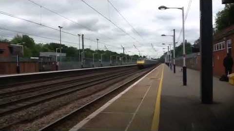 Class 91 225 passing Hitchin At speed. Friday 30th May 2014