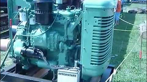 Mike hanging the blade up  while cutting large cherry log Frick sawmill