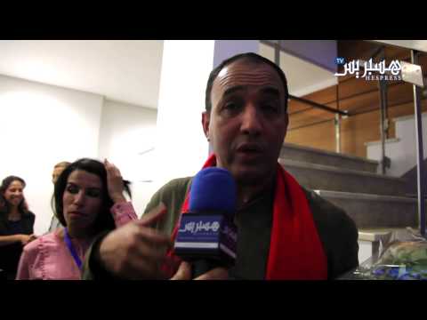 الوالي وقصة الشال الأحمر