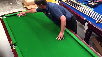 Eddie CHARLTON Coin Table - Padding the pool table