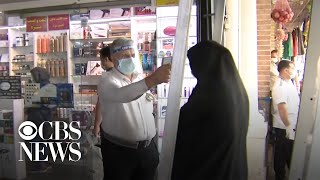 Full As sanctions bite, anxious Iranians watch the U.S. election News