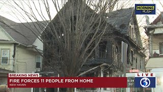 VIDEO: 11 people forced out by house fire in New Haven