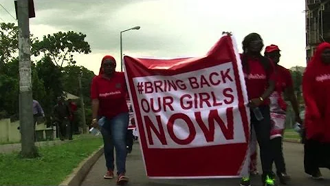 Nigerians rally for Chibok girls six months after kidnapping
