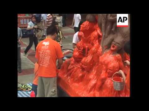 Hong Kong preps for protests; ADDS Amnesty mock torch relay