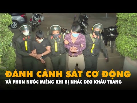 Video Phun nước bọt, đánh cảnh sát cơ động vì chuyện không... - youtube