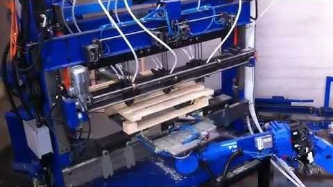 Motoman robots in timber pallet assembly