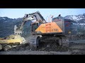 Volvo EC750E loading A30G and 730C - Part 3