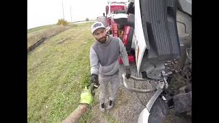 Mckays wrecker towing a tractor trailer