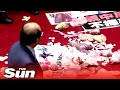 Taiwan MPs throw pig guts & punches in parliament fight