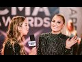 2019 cma awards red carpet katie austin chats with riley green gabby barrett  more