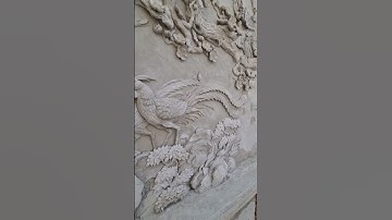 Cặp chim trỉ điêu khắc bằng xi măng