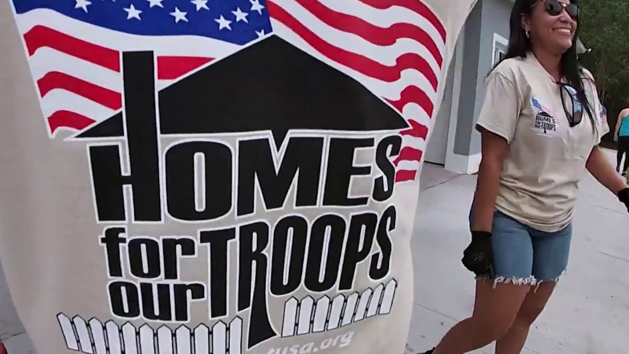 Volunteers help with landscaping at Army veteran’s free new home in Kissimmee