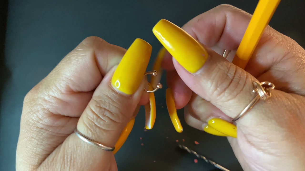 Piercing Ball Holder / Tightener Invention - YouTube