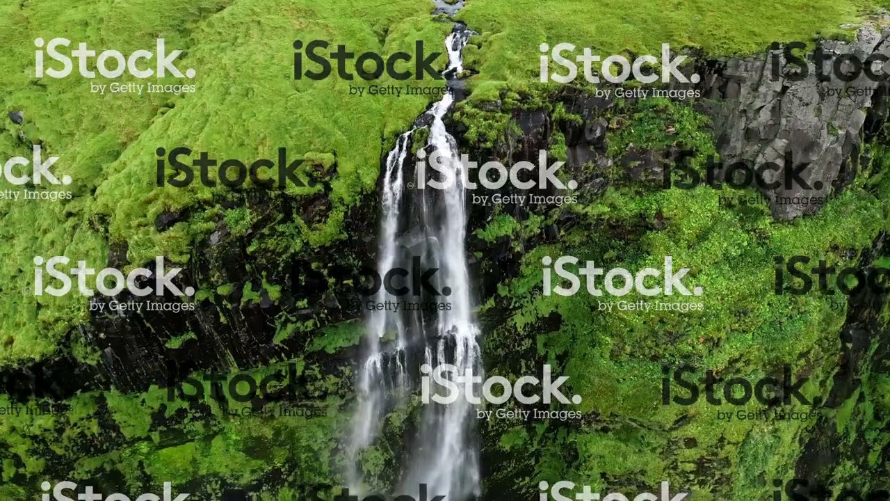 Top view of a flowing Drifandi waterfall, highest waterfall in Iceland — Drífandi — video poster