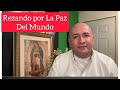 Rezando  el santo rosario por la paz de las guerras en el mundo