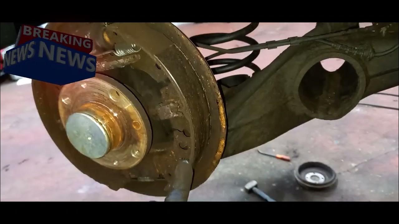 Vauxhall corsa locking wheel nut removal coil spring handbrake