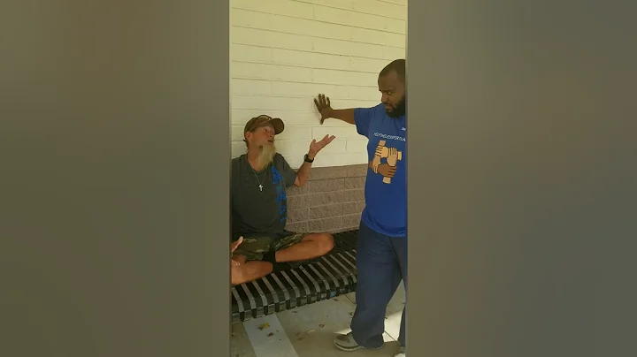 StanTheHelper sharing some of his blessings with Ronald the disabled Homeless guy.