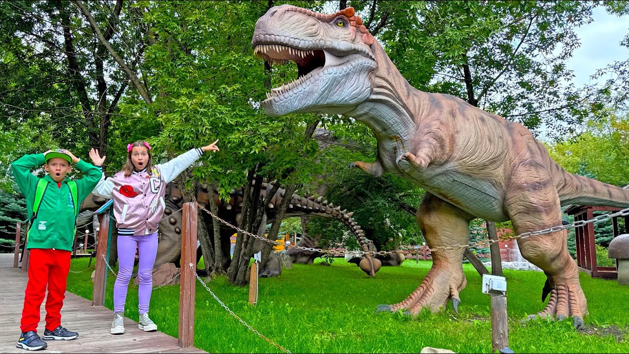 Giant Dinosaurs in kids Park with Sofia and Max