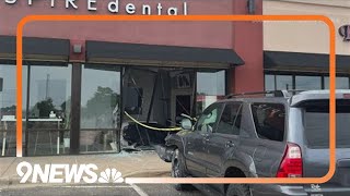 No one hurt after car crashing into building in Highlands Ranch