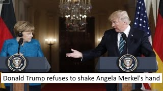 Donald Trump refuses to shake Angela Merkel's hand