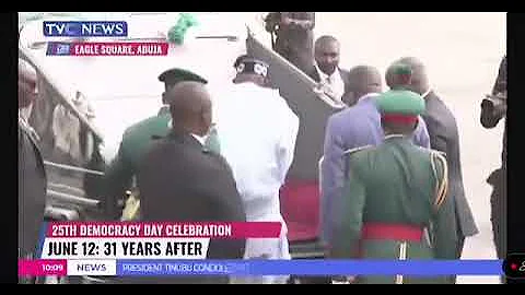 Moment President Bola Tinubu falls while climbing a parade car for Democracy Day celebration today.