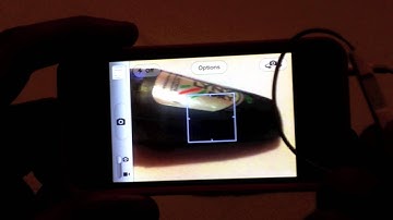 Hidden iOS 5 Features #7 - EarBud Photo Capture!