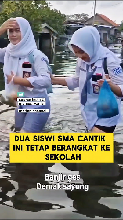 Two beautiful students still school despite flooding