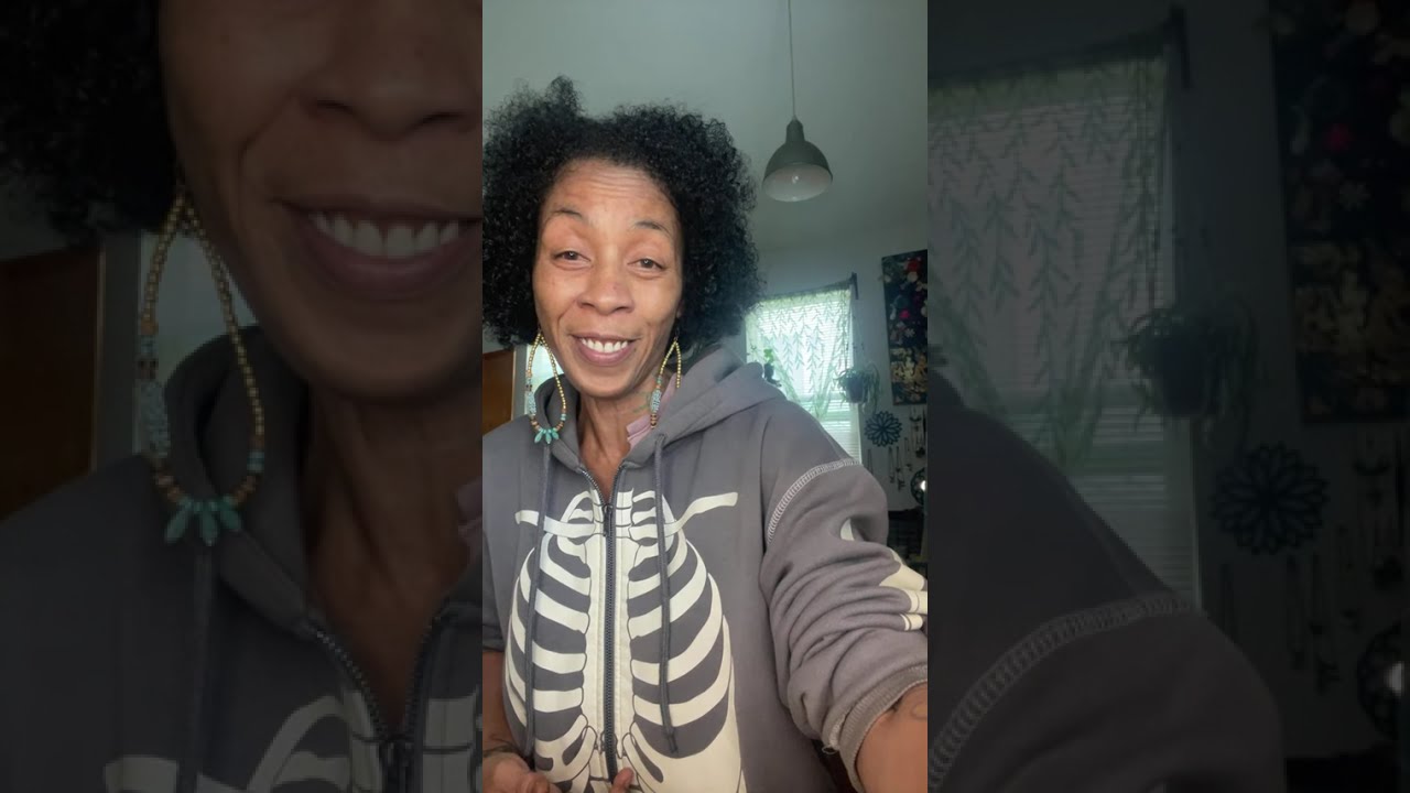 Two faced envy with a smile of jealousy 