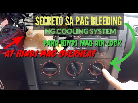 Video: Paano mo papalitan ang coolant sa isang Mazda 3?