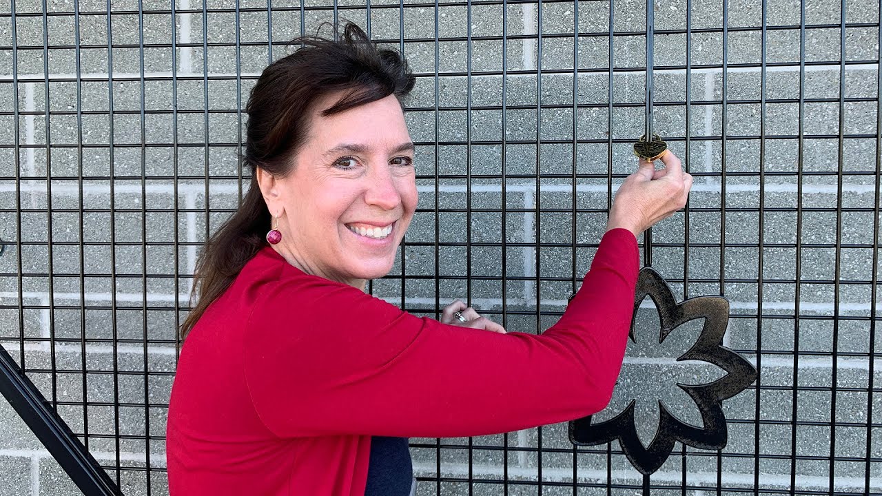 QHC CEO and President Stacey Daub purchases the first BGHF Love Lock in honour of the staff